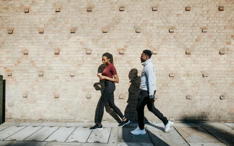 a man and woman walking