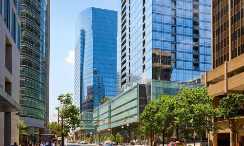 a street with tall buildings on either side of it
