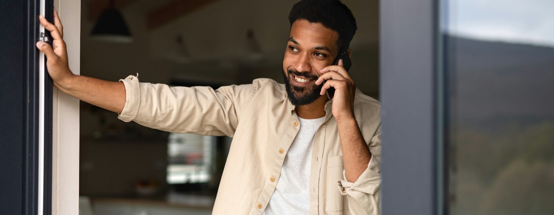a man talking on a cell phone