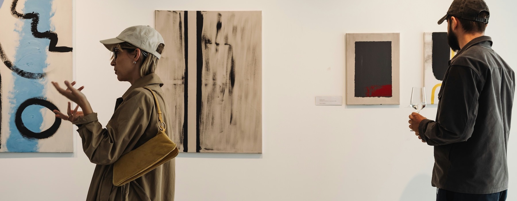 people looking at art in an art gallery